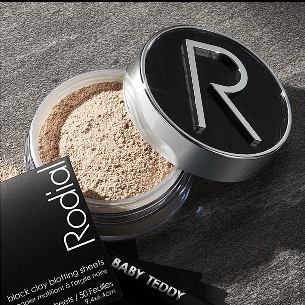 Black and Silver Round Container with R Logo